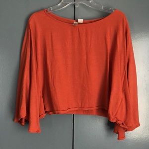 Orange flowy blouse